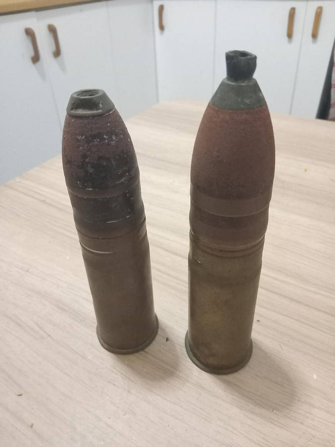 Two used German brass souvenir war bullets with projectile heads