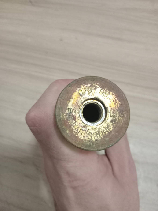 Two used German brass souvenir war bullets with projectile heads