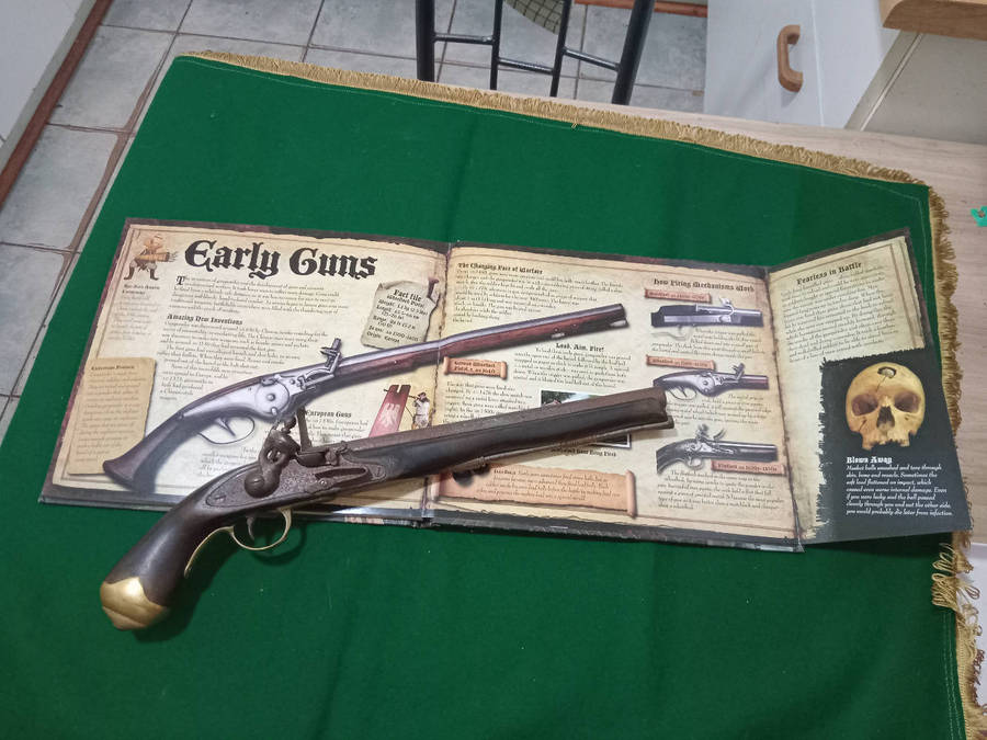 Antique flint lock pistol, original, made from solid heavy wood