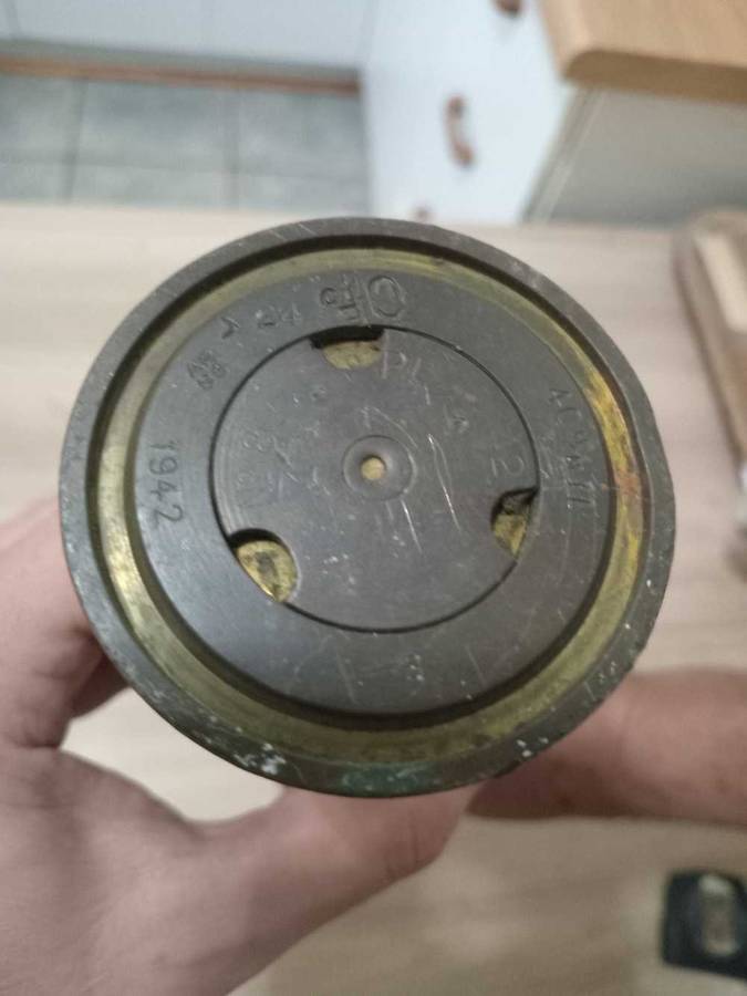 Artillery shell casing with head projectile (empty, used)