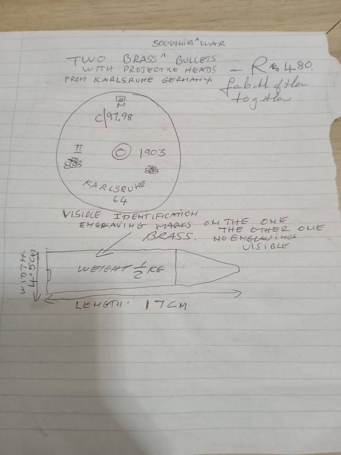 Two used German brass souvenir war bullets with projectile heads