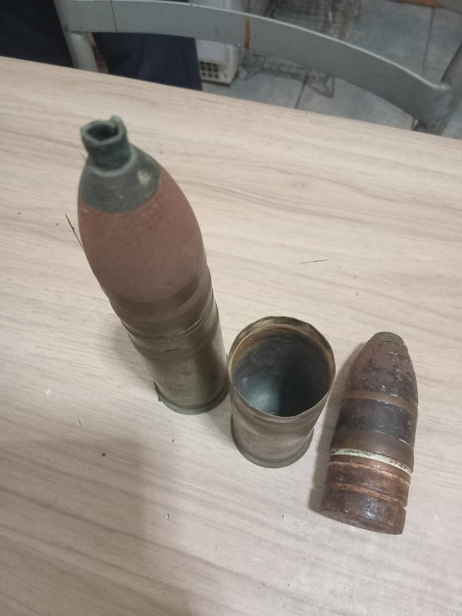 Two used German brass souvenir war bullets with projectile heads