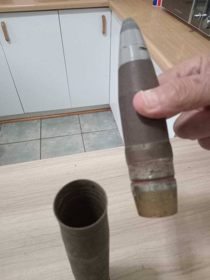 Artillery shell casing with head projectile (empty, used)