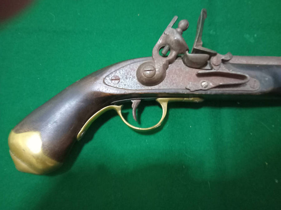 Antique flint lock pistol, original, made from solid heavy wood