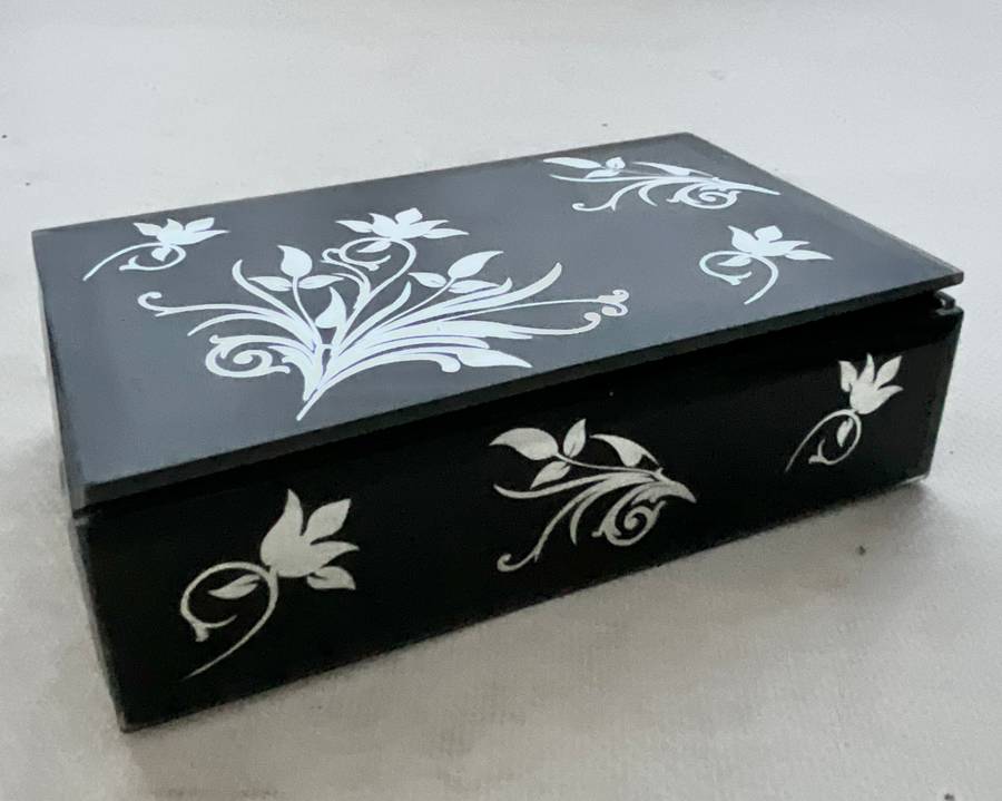 Gorgeous little black box with mirrored floral ornaments, handy for jewellery or keeping small items