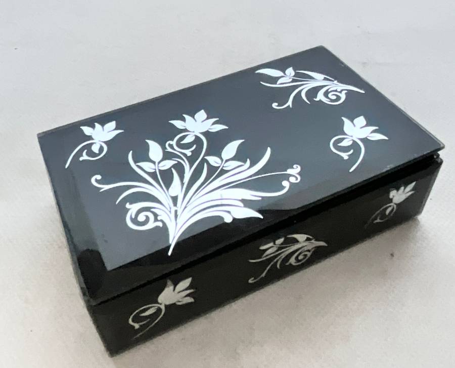 Gorgeous little black box with mirrored floral ornaments, handy for jewellery or keeping small items