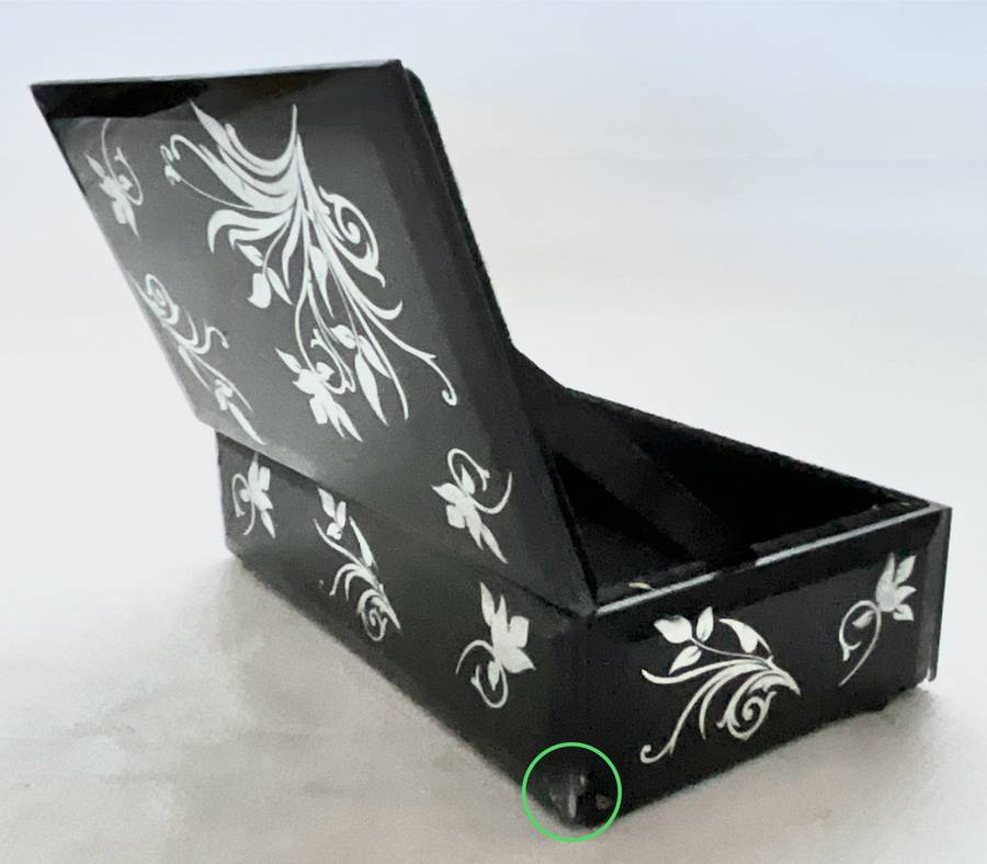 Gorgeous little black box with mirrored floral ornaments, handy for jewellery or keeping small items