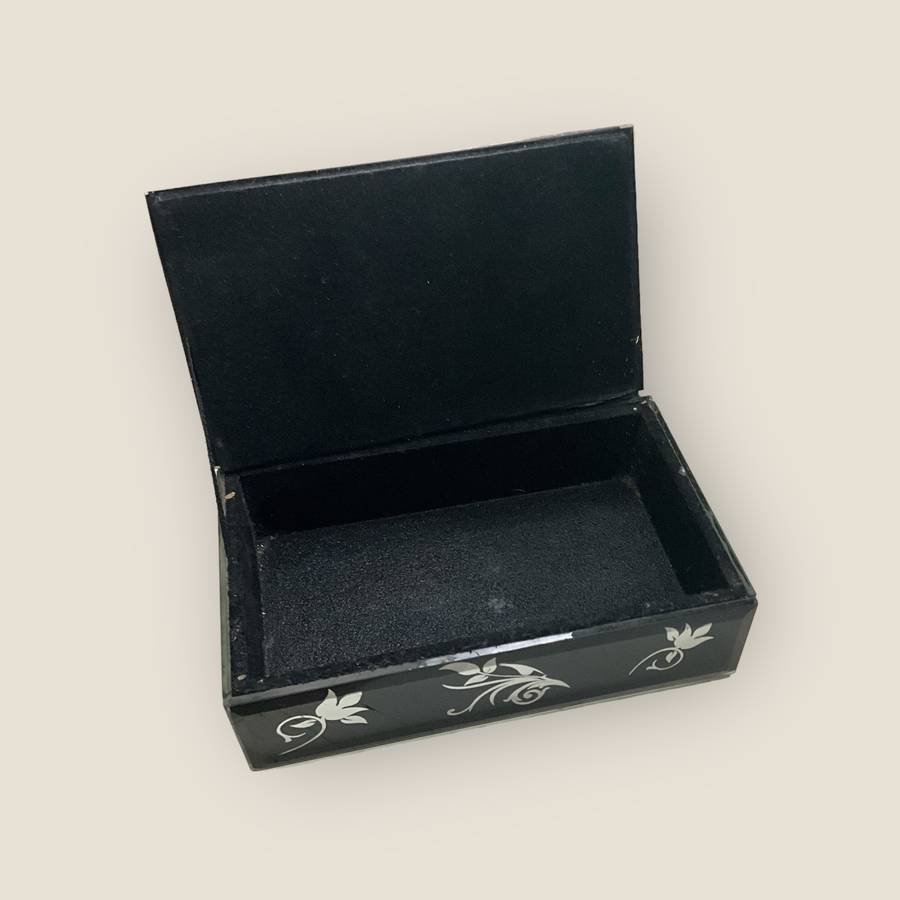 Gorgeous little black box with mirrored floral ornaments, handy for jewellery or keeping small items