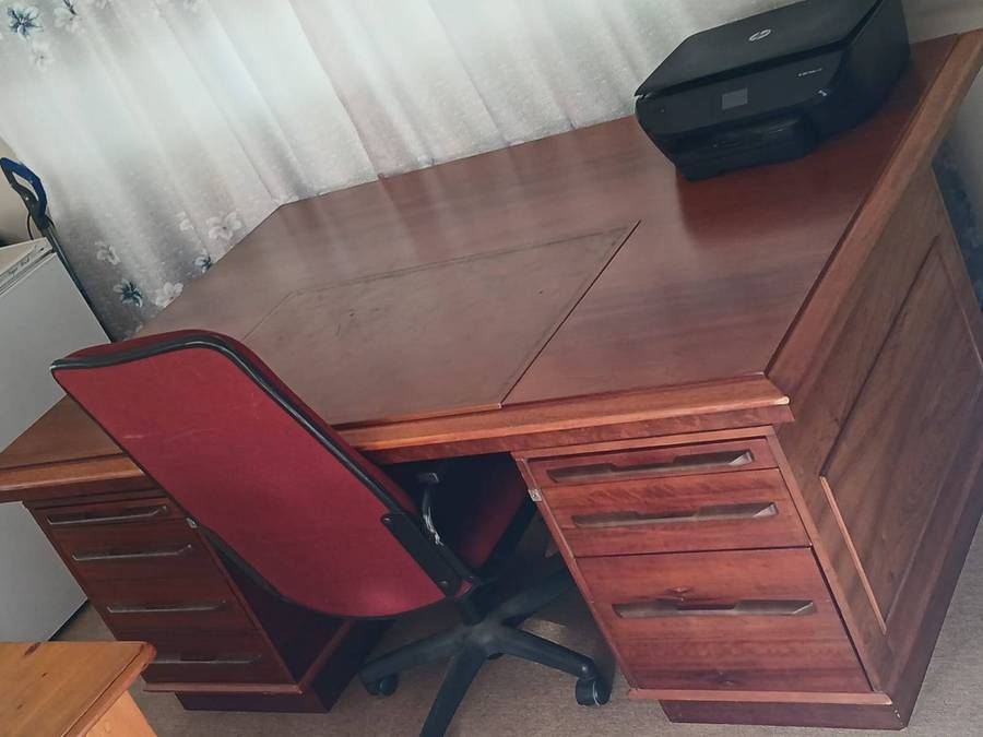 Wooden Executive Partner's Desk With A Leather Inlay Top And Multiple Drawers