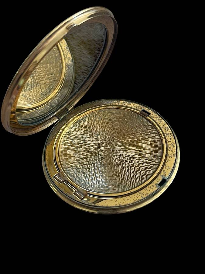 Compact powder/mirror
