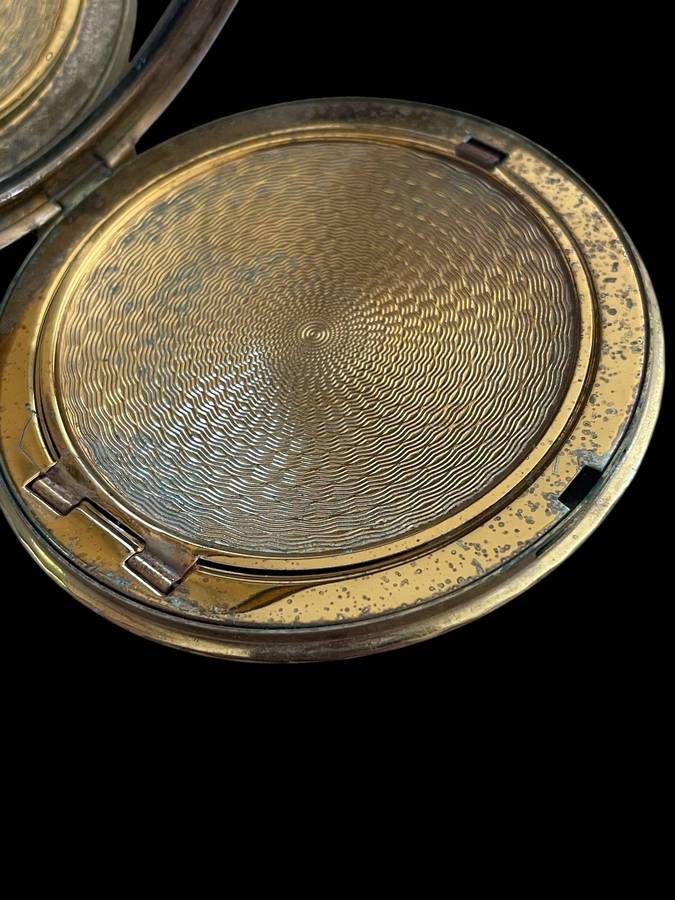 Compact powder/mirror