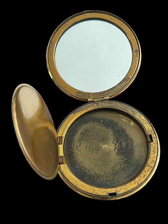 Compact powder/mirror