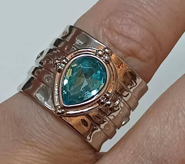 Broad Dress Ring With Imitation Gemstone.