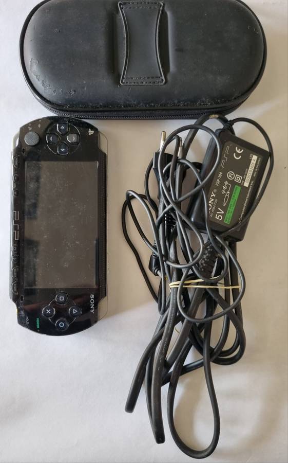 PSP with charger and protective case