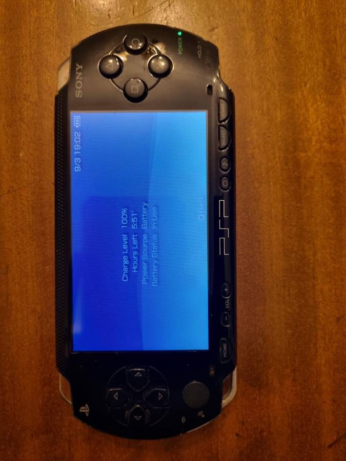 PSP with charger and protective case