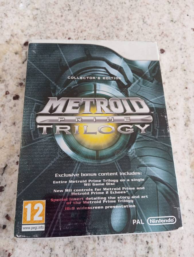 Metroid Prime Trilogy Nintendo WII Manual & History / Art Booklet Included