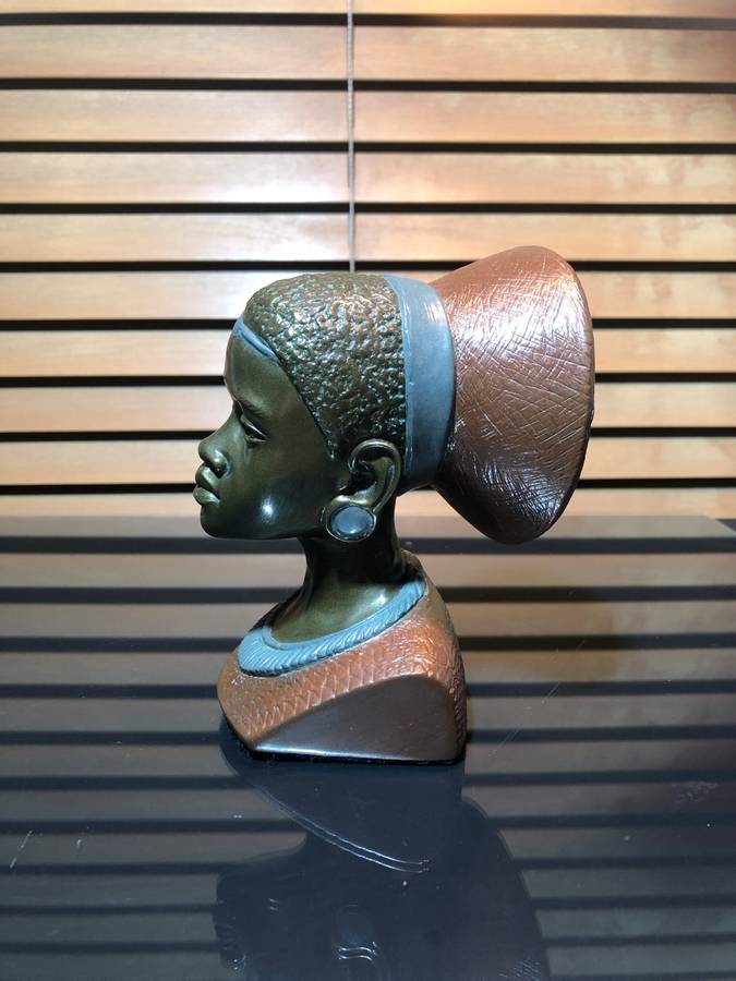 A Bronze Clad Sculpture of a Shona Woman by Casper Darare (1952-2001)