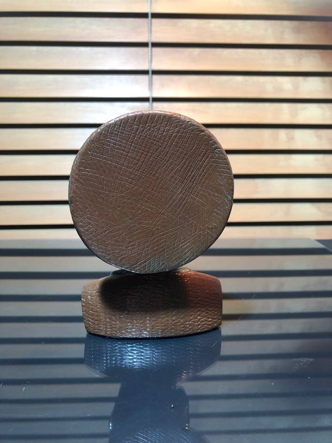 A Bronze Clad Sculpture of a Shona Woman by Casper Darare (1952-2001)