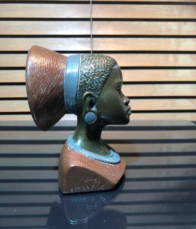 A Bronze Clad Sculpture of a Shona Woman by Casper Darare (1952-2001)