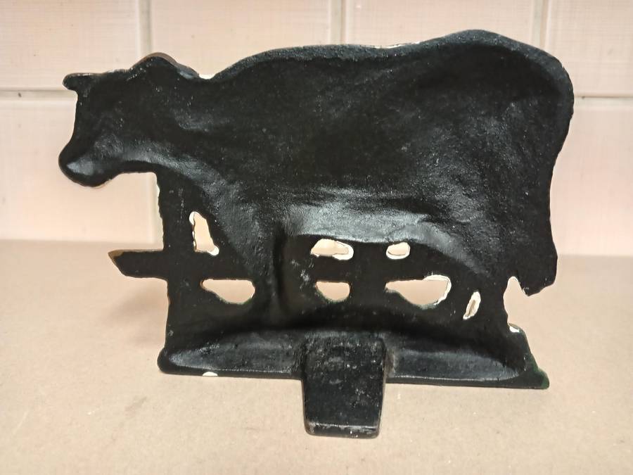 VINTAGE CAST IRON COW SHAPED DOOR STOPPER