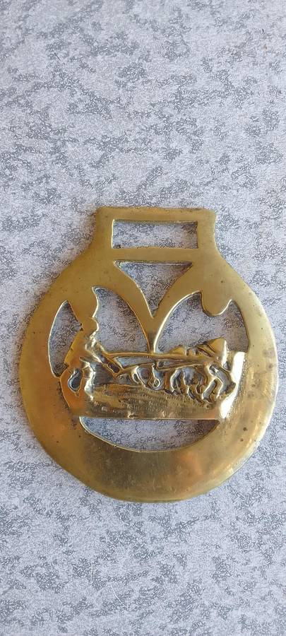 A Collection Of Brass Horse