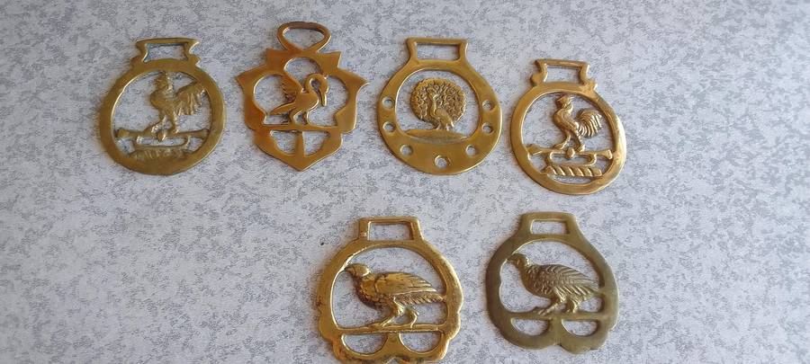 A Collection Of Brass Horse