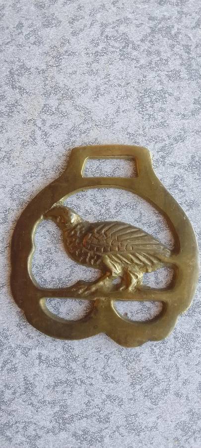 A Collection Of Brass Horse