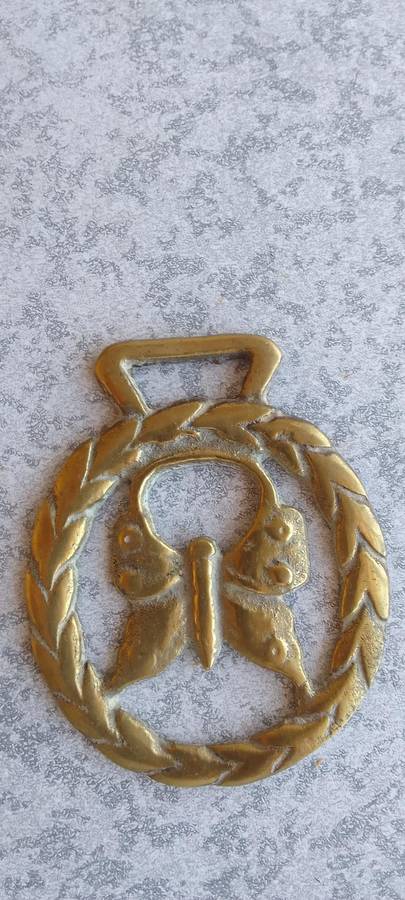 A Collection Of Brass Horse