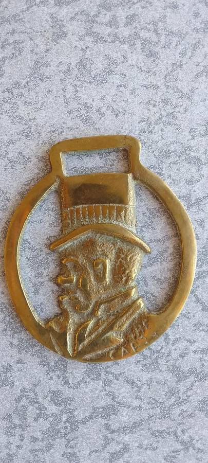 A Collection Of Brass Horse