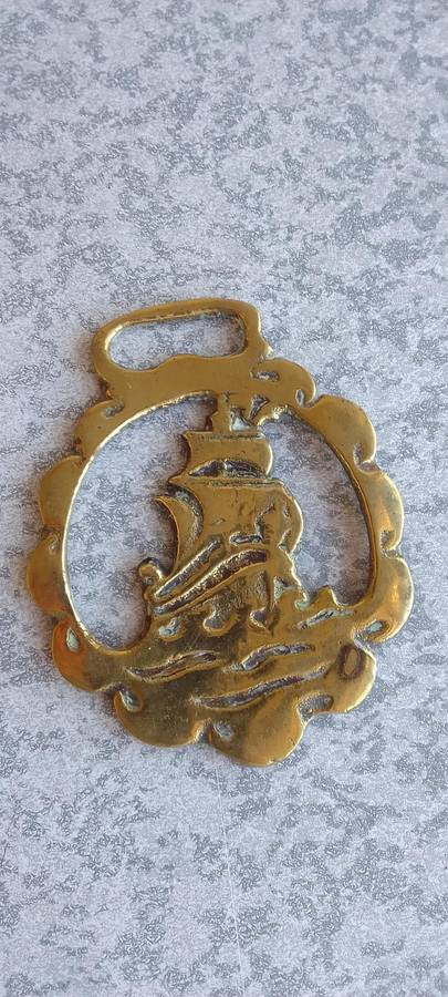 A Collection Of Brass Horse