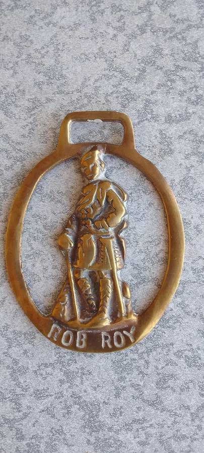 A Collection Of Brass Horse