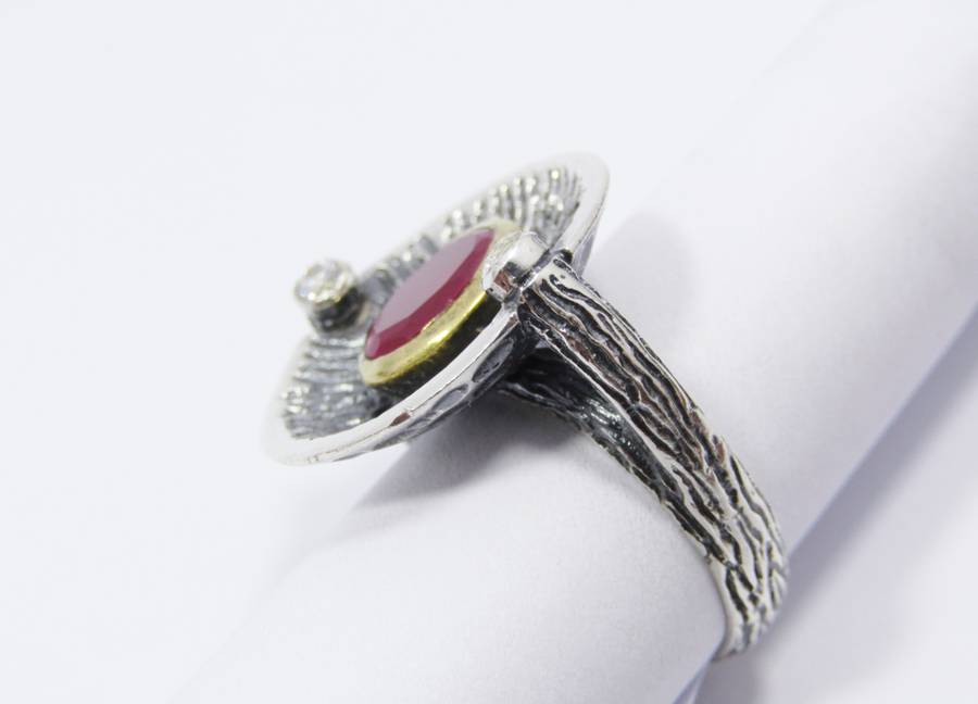 A Stunning Two Tone Brass over Sterling Silver ring with a Synthetic Ruby in Sterling Silver.