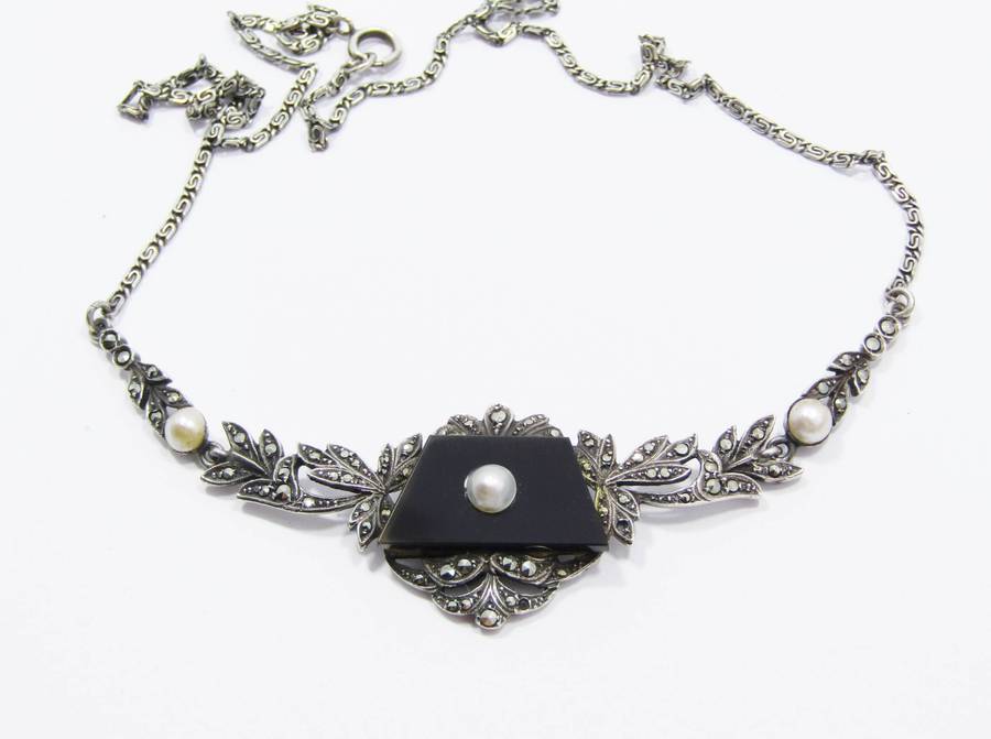 A Gorgeous Vintage Design Onyx Set with a Cultured Pearl Dotted with Marcasite's in 935 Silver