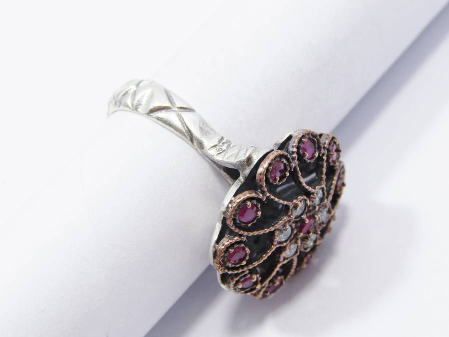 A Lovely Two Tone Eastern Design Ring With Pink and Clear Paste Stones in Sterling Silver.