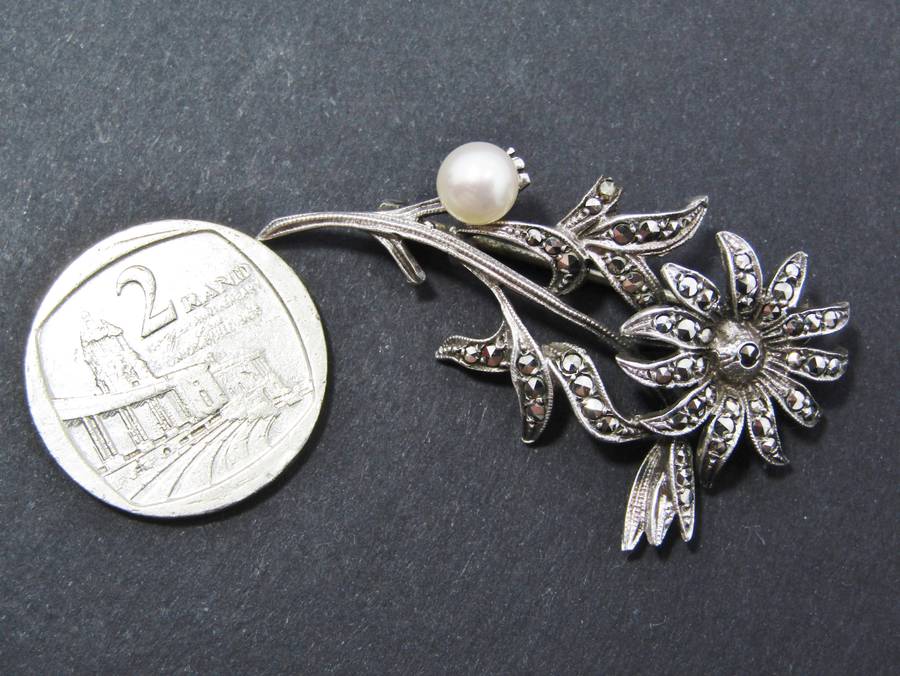 A Gorgeous Vintage Marcasite And Pearl brooch in Sterling Silver.