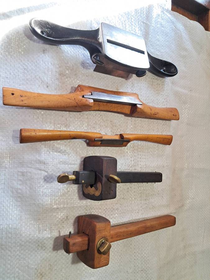 Vintage No. 80 Scraper Plane, two Spoke shaves, and two antique scribes.