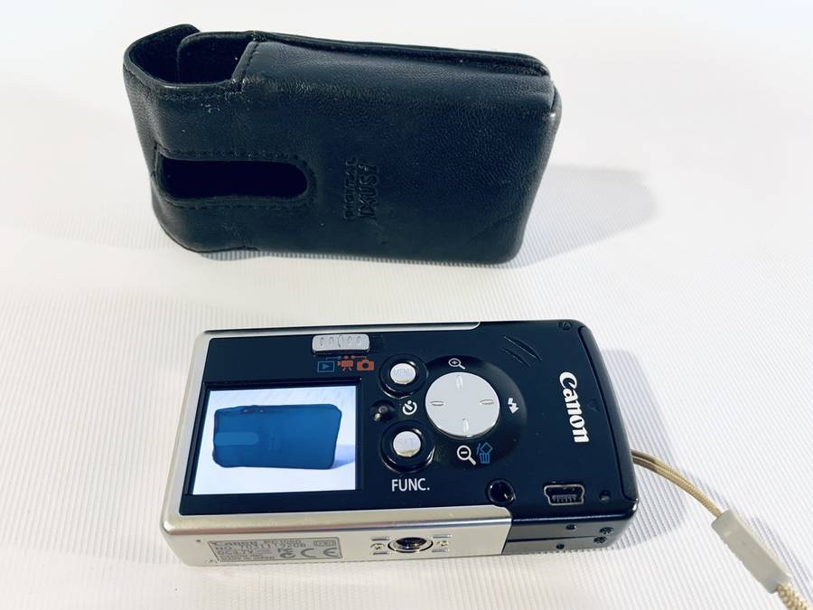 Canon IXUS i Digital Camera 4.0 Mega Pixels  Model PC 1080 (Needs Battery Charger)