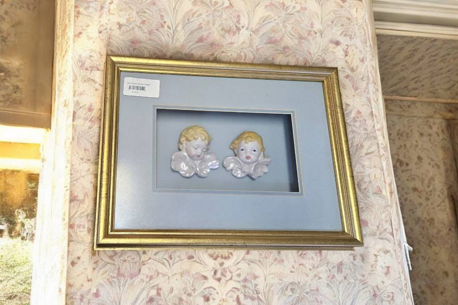 Exquisite boxed frame featuring delicate porcelain angels