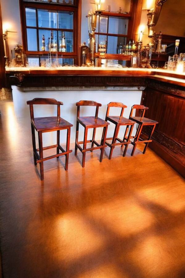 Enhance your home bar with this exquisite Set of 4 Rhodesian Teak Bar Chairs
