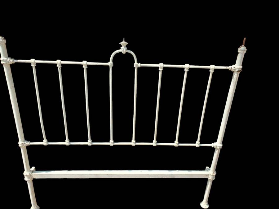 Discover timeless elegance with a Antique Cast Iron Headboard