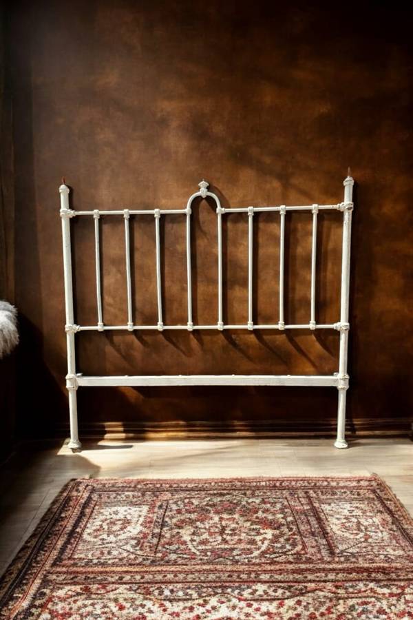 Discover timeless elegance with a Antique Cast Iron Headboard