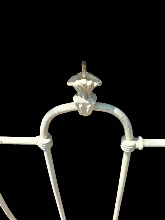 Discover timeless elegance with a Antique Cast Iron Headboard