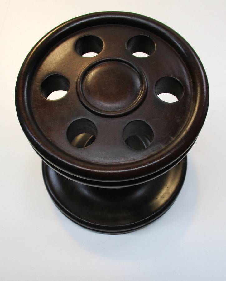 Old solid wood pipe stand for six pipes