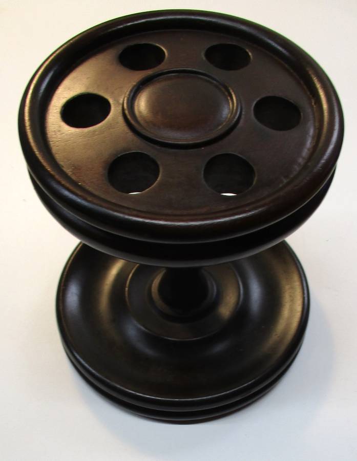 Old solid wood pipe stand for six pipes