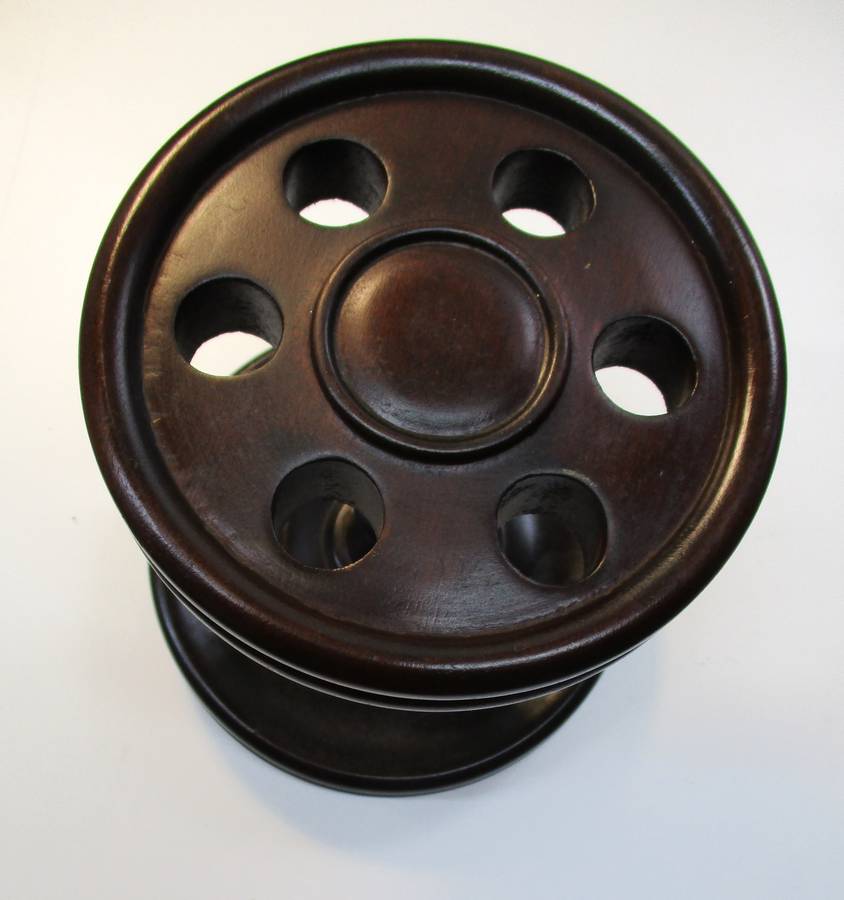 Old solid wood pipe stand for six pipes