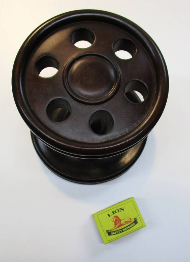 Old solid wood pipe stand for six pipes