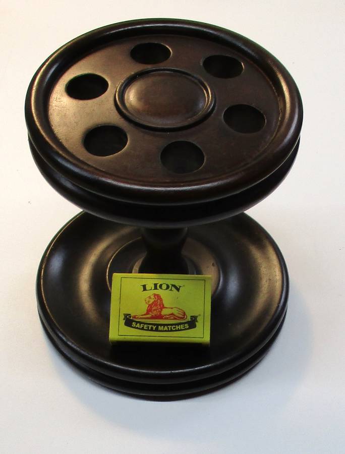 Old solid wood pipe stand for six pipes