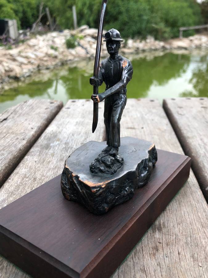 Awesome Bronzed metal miners statue mounted to mahogany base from Wildebeestfontein mine