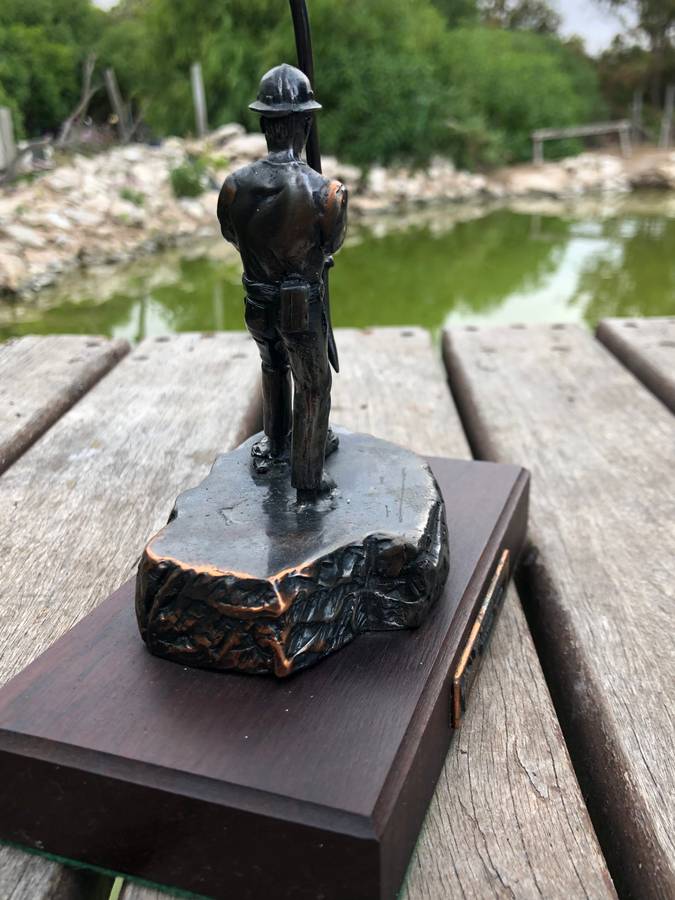 Awesome Bronzed metal miners statue mounted to mahogany base from Wildebeestfontein mine