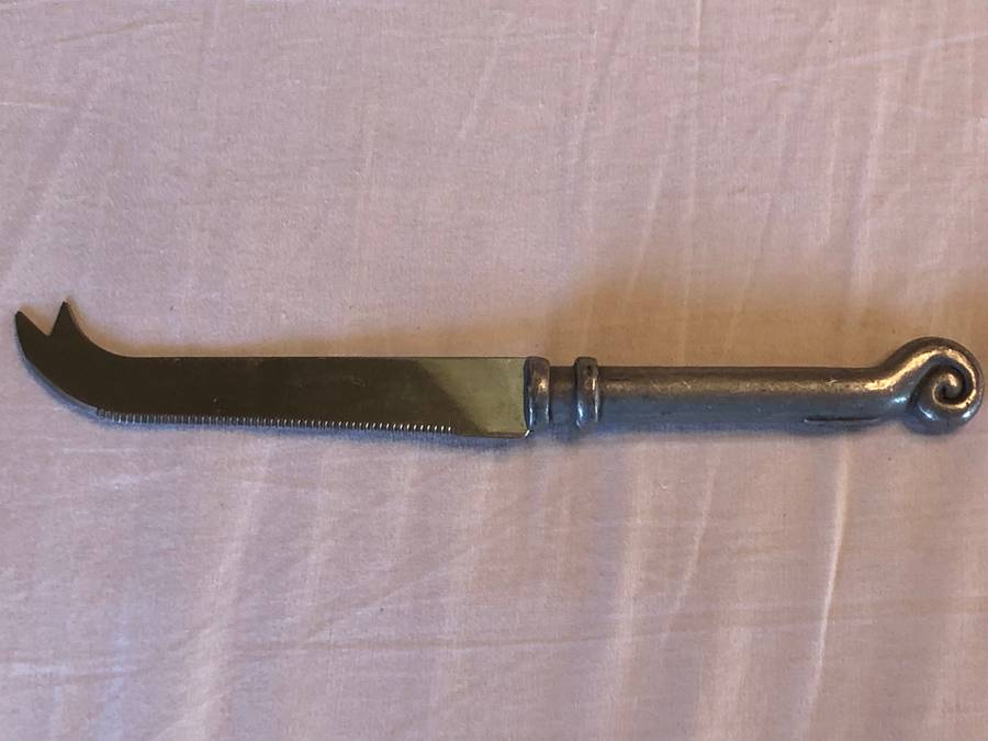 Carrol Boyes coil pattern cheese knife -  serrated blade